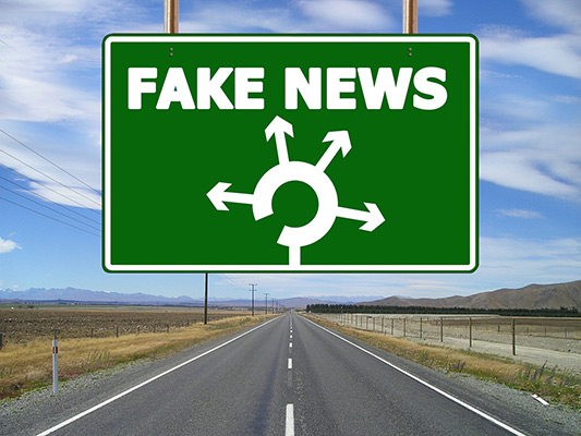 Fake news road sign.