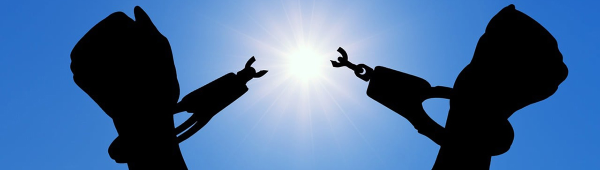 Hands breaking free from the handcuffs of addiction with Hypnosis and  Hypnotherapy in Los Angeles.