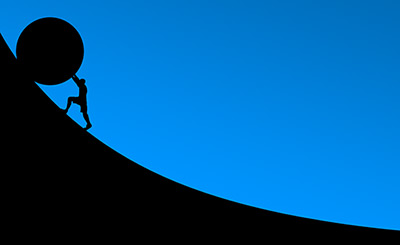 Image of figure pushing a stone up a hill by Elias from Pixabay