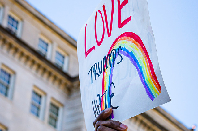love trumps hate sign.