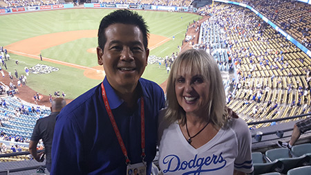 Dr Nancy Irwin and Rob Fukuzaki at Dodgers game.