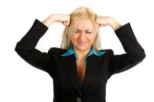 Think Yourself Thin photo of woman illustrating weight loss by trying to think herself thin.